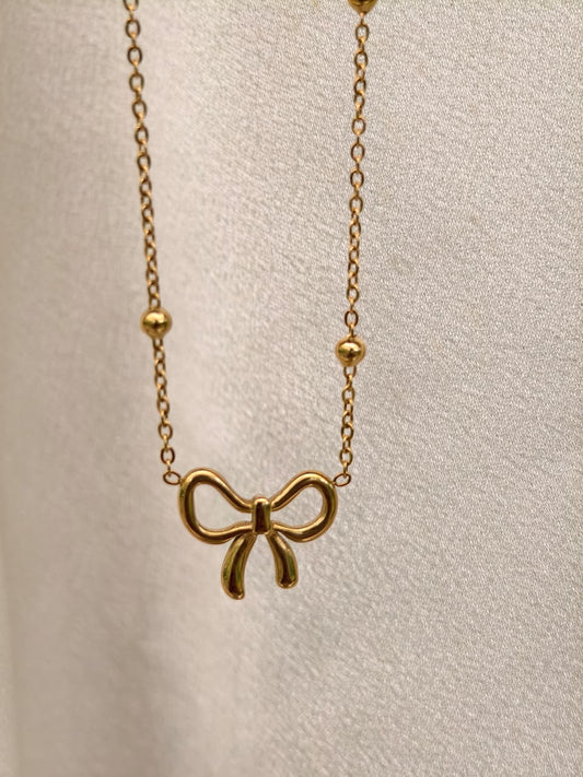 Eternal kiss bow necklace